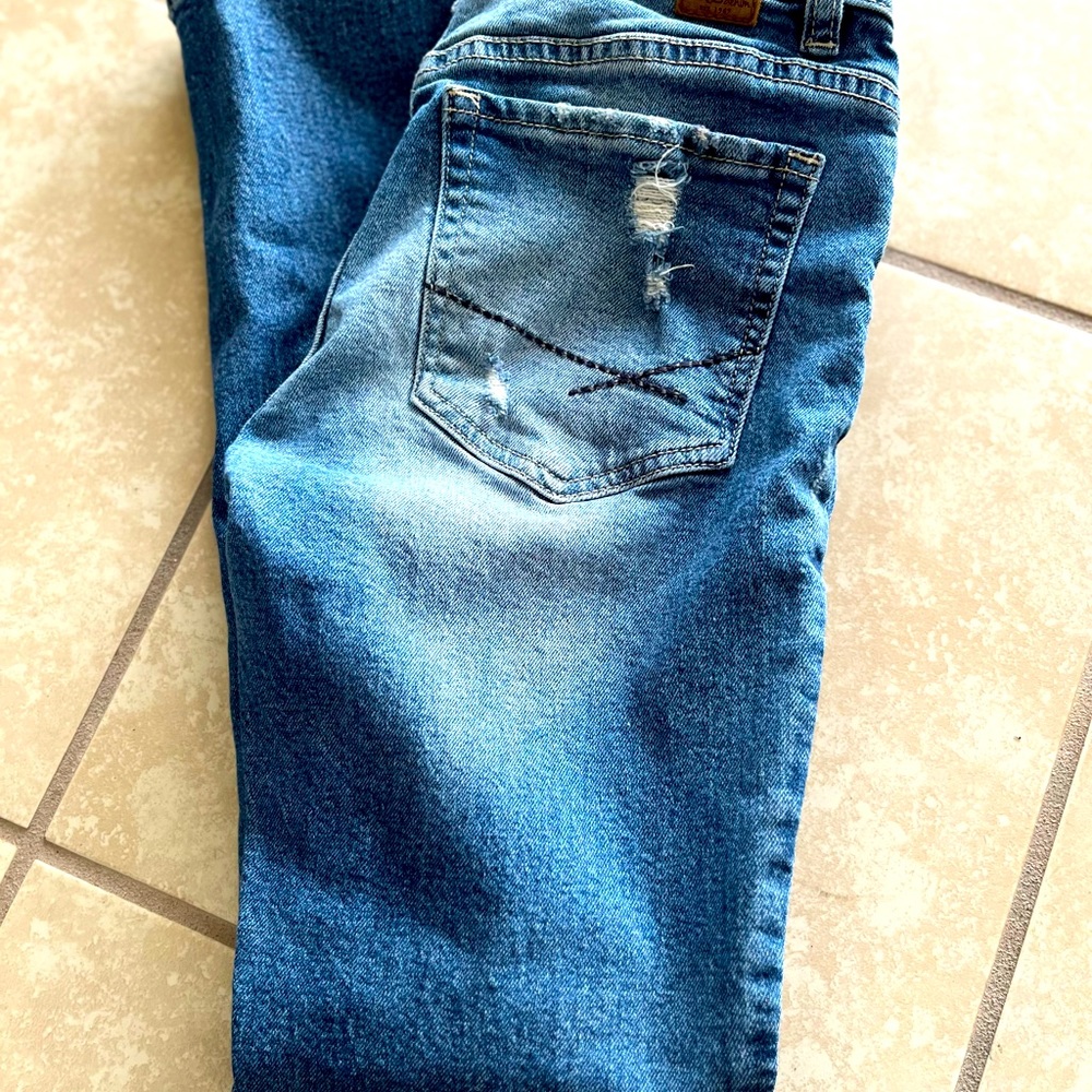 Buckle midrise size 25 jeans